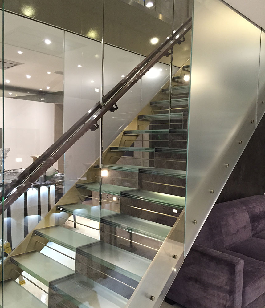 Commercial window film on glass stairwell